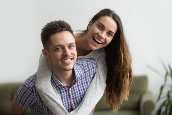 Photo of smiling couple illustrates blog: "What Is Whole Life Insurance?"