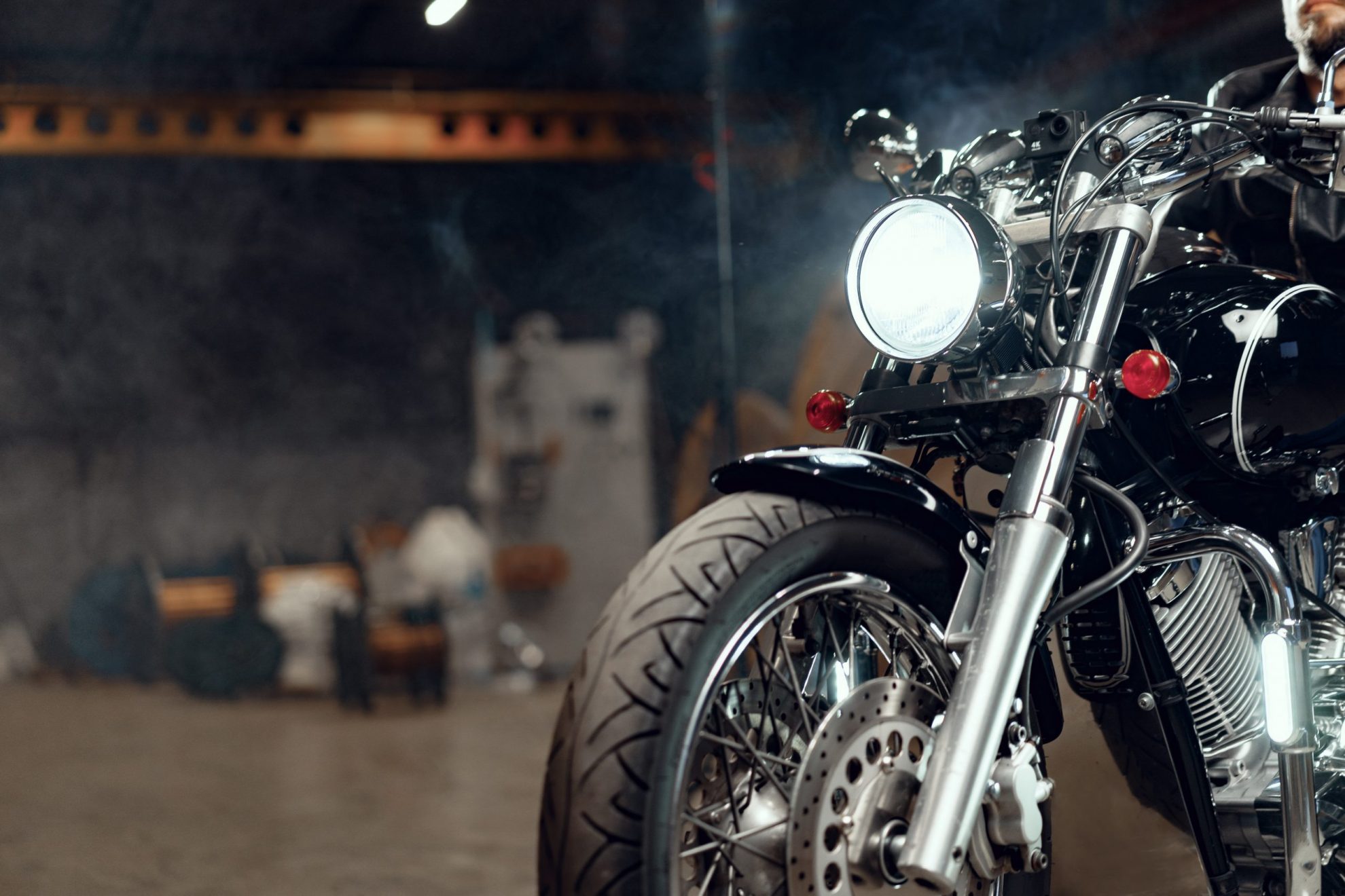 Photo of motorcycle in garage illustrates blog: "Tips To Prevent Motorcycle Theft"